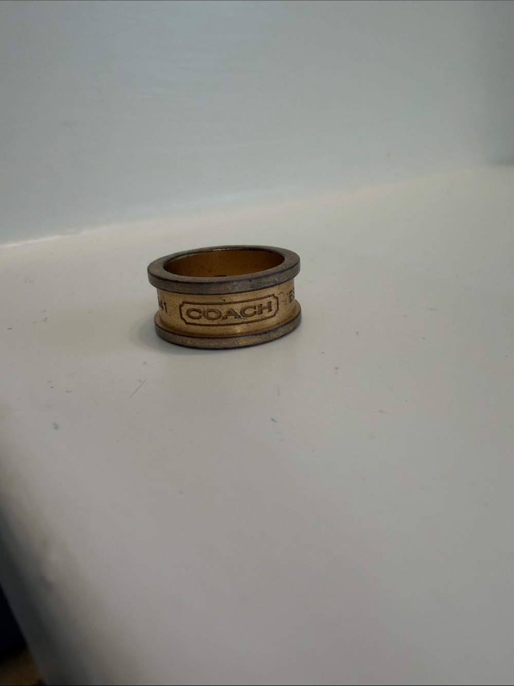 COACH  Signature Brass-Tone Logo Band Ring in Gold